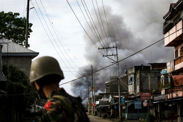 Smoke rises following airstrikes by the Philippine Air Force at militant positions in the besieged city of Marawi, southern Philippines, June 6, 2017 (Sipa photo by Richard Atrero de Guzman via AP).