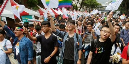 Same-sex marriage supporters cheer after a Constitutional Court ruling, Taipei, Taiwan, May 24, 2017 (AP photo by Chiang Ying-ying).
