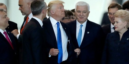 U.S. President Donald Trump appears to push past Dusko Markovic, Montenegro’s prime minister, during a meeting of NATO heads of state, Brussels, May 25, 2017 (AP photo by Matt Dunham).