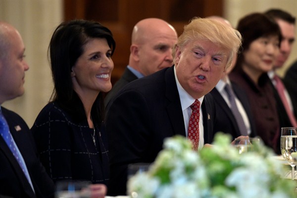 President Donald Trump and Nikki Haley, the U.S. ambassador to the U.N., during a working lunch with ambassadors from U.N. Security Council countries and their spouses, Washington, April 24, 2017 (AP photo by Susan Walsh).