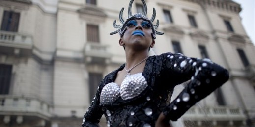 A person in costume poses for a portrait during the annual LGBT pride parade, Buenos Aires, Argentina, Nov. 15, 2014 (AP photo by Natacha Pisarenko).