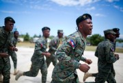 Members of Haiti’s new national military force run during training at a former U.N. base, Gressier, Haiti, April 11, 2017 (AP photo by Dieu Nalio Chery).