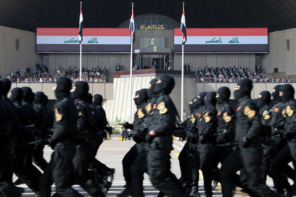 Iraqi troops march in a military parade during celebrations marking the recapture of Mosul from Islamic State militants, Baghdad, July 15, 2017 (Iraqi Prime Minister’s media office via AP).