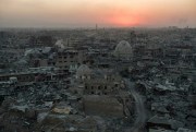 The sun sets on the historic and largely destroyed Old City on the west side of Mosul, Iraq, July 11, 2017 (AP photo by Felipe Dana).