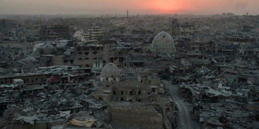 The sun sets on the historic and largely destroyed Old City on the west side of Mosul, Iraq, July 11, 2017 (AP photo by Felipe Dana).