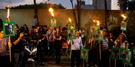Protesters carry images of murdered journalist Javier Valdez during a demonstration outside the Interior Ministry in Mexico City, May 16, 2017 (AP photo by Rebecca Blackwell).