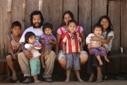 An Ache family poses for a portrait at their home, Kuetuvy, Paraguay, Jan. 20, 2013 (AP photo by Jorge Saenz).