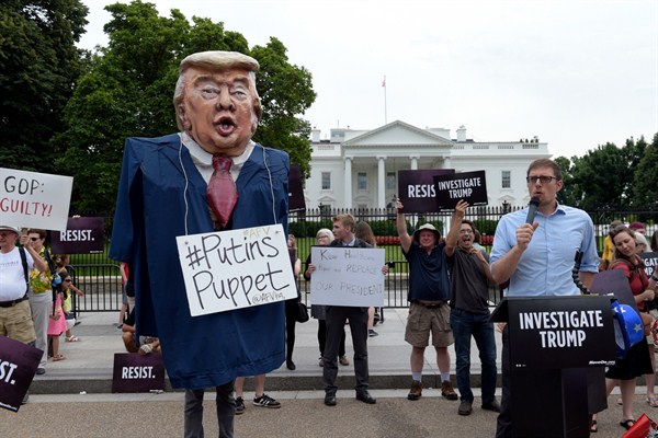 People gather outside the White House to protest President Donald Trump, Washington, July 11, 2017 (AP photo by Susan Walsh).