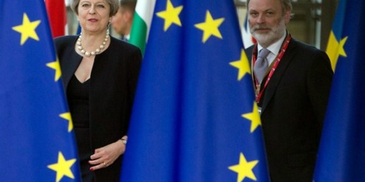 British Prime Minister Theresa May and U.K. Representative to the EU Tim Barrow at an EU summit, Brussels, June 22, 2017 (AP photo by Virginia Mayo).