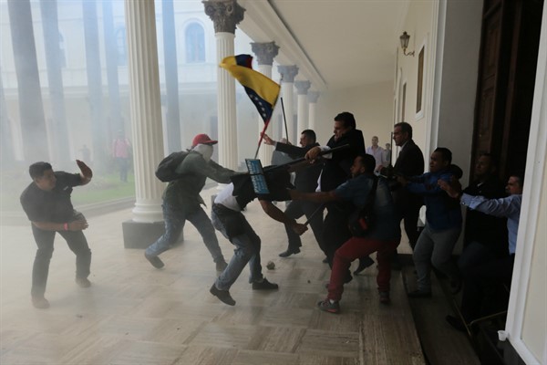 Venezuelan opposition lawmakers brawl with pro-government militias at the National Assembly, Caracas, July 5, 2017 (AP photo by Fernando Llano).