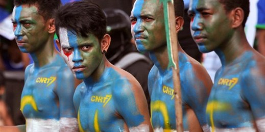 Supporters of CNRT Party have their face and body painted with the party's colors during a campaign rally, Dili, East Timor, July 17, 2017 (AP photo by Kandhi Barnez).