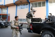 Security forces leave after responding to an attack on the Iraqi embassy in Kabul, Afghanistan, July 31, 2017 (AP photo by Rahmat Gul).