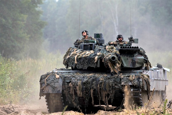 Soldiers of the NATO enhanced forward presence battalion in a German Leopard 2 tank take part in NATO military exercises at the Rukla military base, west of Vilnius, Lithuania, Aug. 11, 2017 (AP photo by Mindaugas Kulbis).