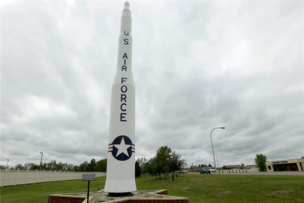 A retired Minuteman 1 ballistic missile at the entrance to Minot Air Force Base in North Dakota. In 1971, the Minuteman 1 was replaced by the Minuteman 3, which forms the foundation of the U.S. nuclear defense strategy (AP photo by Charlie Riedel).
