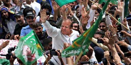 Former Pakistani Prime Minister Nawaz Sharif waves to supporters gathered on a highway outside Islamabad, Aug. 5, 2017 (AP photo by Anjum Naveed).