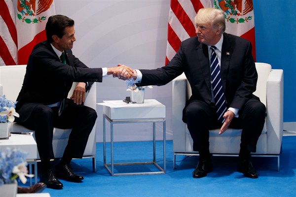 President Donald Trump meets with Mexican President Enrique Pena Nieto at the G-20 Summit, Hamburg, July 7, 2017 (AP photo by Evan Vucci).