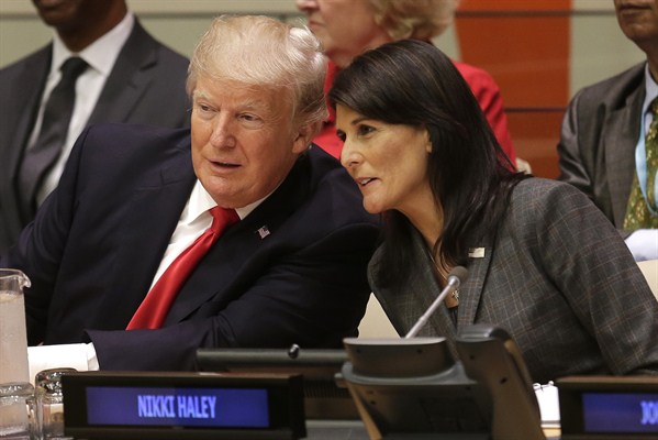 U.S. Ambassador to the U.N. Nikki Haley speaks with U.S. President Donald Trump before a meeting during the U.N. General Assembly at U.N. headquarters, New York, Sept. 18, 2017 (AP photo by Seth Wenig).
