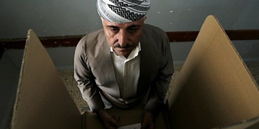 An Iraqi Kurdish man prepares to cast his ballot during the referendum on independence from Iraq, Irbil, Iraq, Sept. 25, 2017 (AP photo by Khalid Mohammed).