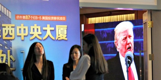 A projector screen shows footage of U.S. President Donald Trump during an event promoting EB-5 investment in a Kushner Companies development at a hotel in Shanghai, China, May 7, 2017 (AP photo).