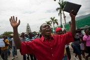 A protester holds up a Bible as he chants anti-gay slogans, Port-au-Prince, Haiti, July 19, 2013 (AP photo by Dieu Nalio Chery).
