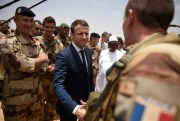 French President Emmanuel Macron visits soldiers participating in Operation Barkhane, Gao, Mali, May 19, 2017 (Pool photo via AP).