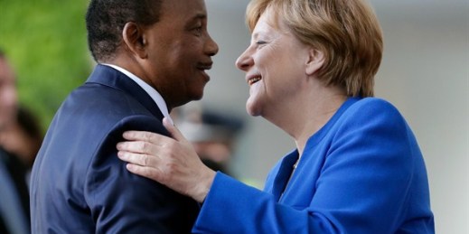 German Chancellor Angela Merkel welcomes Niger’s president, Mahamadou Issoufou, to a conference on G-20 partnerships with Africa, Berlin, June 12, 2017 (AP photo by Michael Sohn).