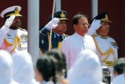 President Maithripala Sirisena looks on during an Independence Day parade, Colombo, Sri Lanka, Feb. 4, 2016 (AP photo by Eranga Jayawardena).