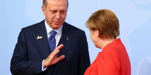 German Chancellor Angela Merkel greets Turkish President Recep Tayyip Erdogan upon his arrival at the G20 meeting in Hamburg, Germany on July 7, 2017 (Photo by Emmanuele Contini for SIPA USA via AP).