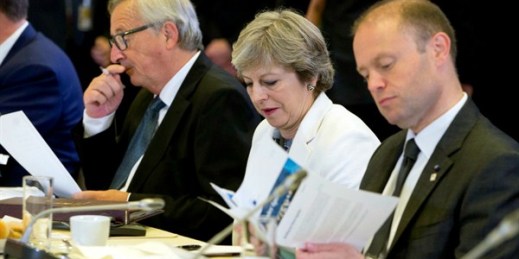 British Prime Minister Theresa May, center, European Commission President Jean-Claude Juncker, left, and Malta’s prime minister, Joseph Muscat, right, at an EU summit, Brussels, Oct. 20, 2017 (AP photo by Virginia Mayo).