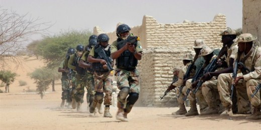 Nigerian special forces run past Chadian troops in a U.S.-led hostage rescue exercise, Mao, Chad, March 7, 2015 (AP photo by Jerome Delay).