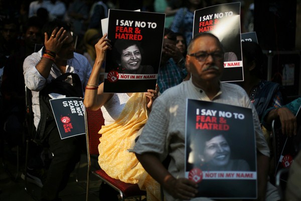 Demonstrators hold placards as they participate in a protest condemning the killing of journalist Gauri Lankesh, New Delhi, India, Sept. 7, 2017 (AP photo by Altaf Qadri).