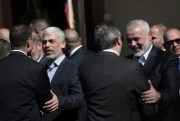 Hamas’ leader in the Gaza Strip, Yahya Sinwar, left, and the head of its political bureau, Ismail Haniyeh, welcome members of Egypt’s intelligence security delegation, Gaza City, Oct. 3, 2017 (AP photo by Khalil Hamra).