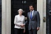 British Prime Minister Theresa May greets Qatari Emir Tamim bin Hamad Al Thani at 10 Downing Street, London, Sept. 15, 2016 (AP photo by Tim Ireland).