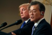 U.S. President Donald Trump listens to South Korean President Moon Jae-in during a joint news conference at the Blue House in Seoul, South Korea, Nov. 7, 2017 (AP photo Andrew Harnik).