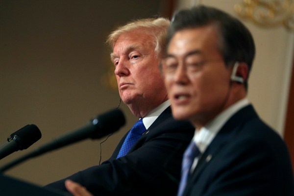 U.S. President Donald Trump listens to South Korean President Moon Jae-in during a joint news conference at the Blue House in Seoul, South Korea, Nov. 7, 2017 (AP photo Andrew Harnik).