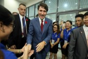 Canadian Prime Minister Justin Trudeau is greeted by well-wishers after a press conference held on the sidelines of the APEC forum, Danang, Vietnam, Nov. 11, 2017 (AP photo by Mark Schiefelbein).