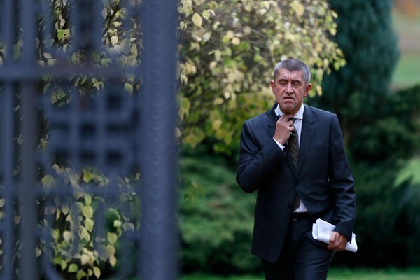Andrej Babis, the Czech billionaire and leader of the ANO, adjusts his tie after meeting with Czech President Milos Zeman, Lany, Czech Republic, Oct. 23, 2017 (AP photo by Petr David Josek).