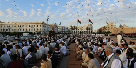 Worshipers attend a sermon during Eid al-Adha at the Martyrs Square, Tripoli, Libya, Sept. 24, 2015 (AP photo by Mohamed Ben Khalifa).