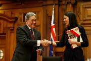 New Zealand First leader Winston Peters and Prime Minister-designate Jacinda Ardern shake hands after signing a coalition agreement, Wellington, Oct. 24, 2017 (AP photo by Nick Perry).