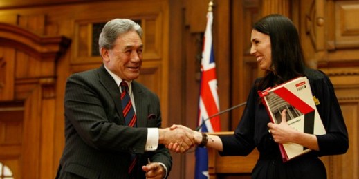 New Zealand First leader Winston Peters and Prime Minister-designate Jacinda Ardern shake hands after signing a coalition agreement, Wellington, Oct. 24, 2017 (AP photo by Nick Perry).