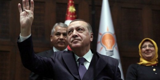 Turkish President Recep Tayyip Erdogan acknowledges his supporters during an appearance in parliament, Ankara, Turkey, Nov. 21, 2017 (AP photo by Burhan Ozbilici).