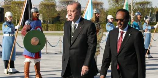 Turkish President Recep Tayyip Erdogan walks with Somali President Mohamed Abdullahi Mohamed during a welcome ceremony, Ankara, Turkey, April, 26, 2017 (Presidency Press Service photo via AP).