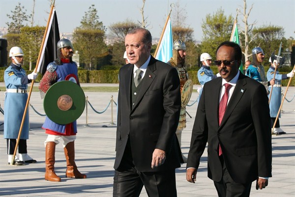 Turkish President Recep Tayyip Erdogan walks with Somali President Mohamed Abdullahi Mohamed during a welcome ceremony, Ankara, Turkey, April, 26, 2017 (Presidency Press Service photo via AP).