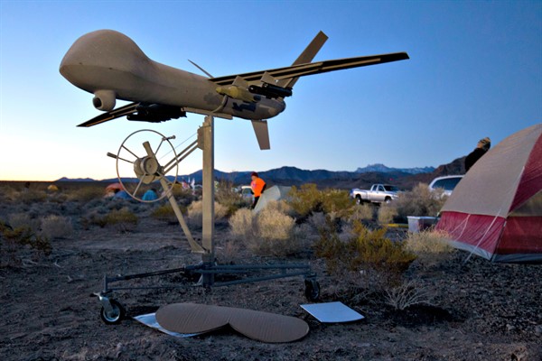 A drone model at a protest encampment near Creech Air Force Base outside Las Vegas, where people were demonstrating against remotely piloted armed drone missions in Afghanistan, Pakistan, Yemen and Somalia, March 6, 2015 (AP photo by Steve Marcus).