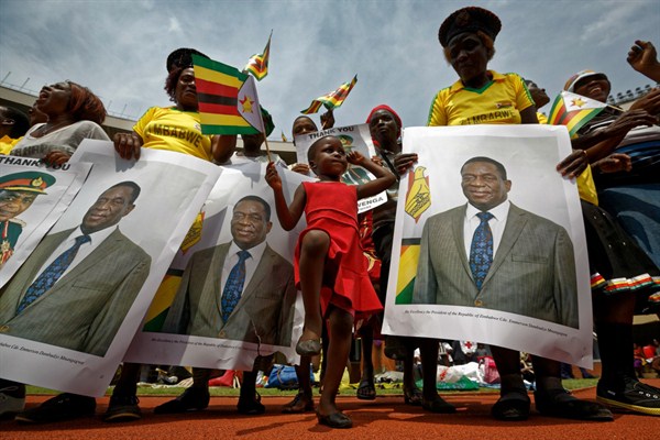 A young girl marches during a military parade at the inauguration of new Zimbabwean President Emmerson Mnangagwa, Harare, Zimbabwe, Nov. 24, 2017 (AP photo by Ben Curtis).