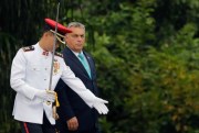 Hungarian Prime Minister Viktor Orban proceeds to inspect the honor guard during a welcome ceremony in Singapore, Sept. 26, 2017 (AP photo by Wong Maye-E).