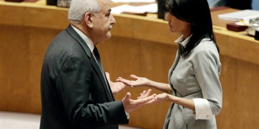 Palestinian Ambassador to the United Nations Riyad Mansour and U. S. Ambassador Nikki Haley confer before a Security Council meeting at United Nations headquarters, Dec. 8, 2017 (AP photo by Richard Drew).