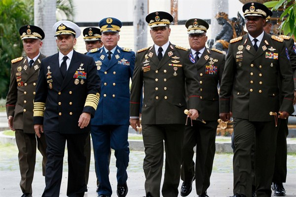 Venezuelan Defense Minister Vladimir Padrino Lopez, center right, accompanied by a group of military commanders, arrives for a session of the Constitutional Assembly, Caracas, Aug. 8, 2017 (AP photo by Ariana Cubillos).