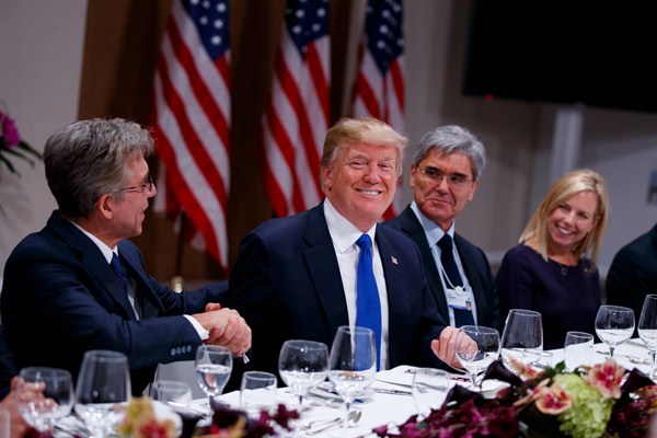 President Donald Trump listens during a dinner with European business leaders at the World Economic Forum in Davos, Switzerland, Jan. 25, 2018 (AP photo by Evan Vucci).