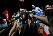 Sebastian Pinera greets supporters as they celebrate his victory in the presidential election runoff, Santiago, Chile, Dec. 17, 2017 (AP photo by Esteban Felix).
